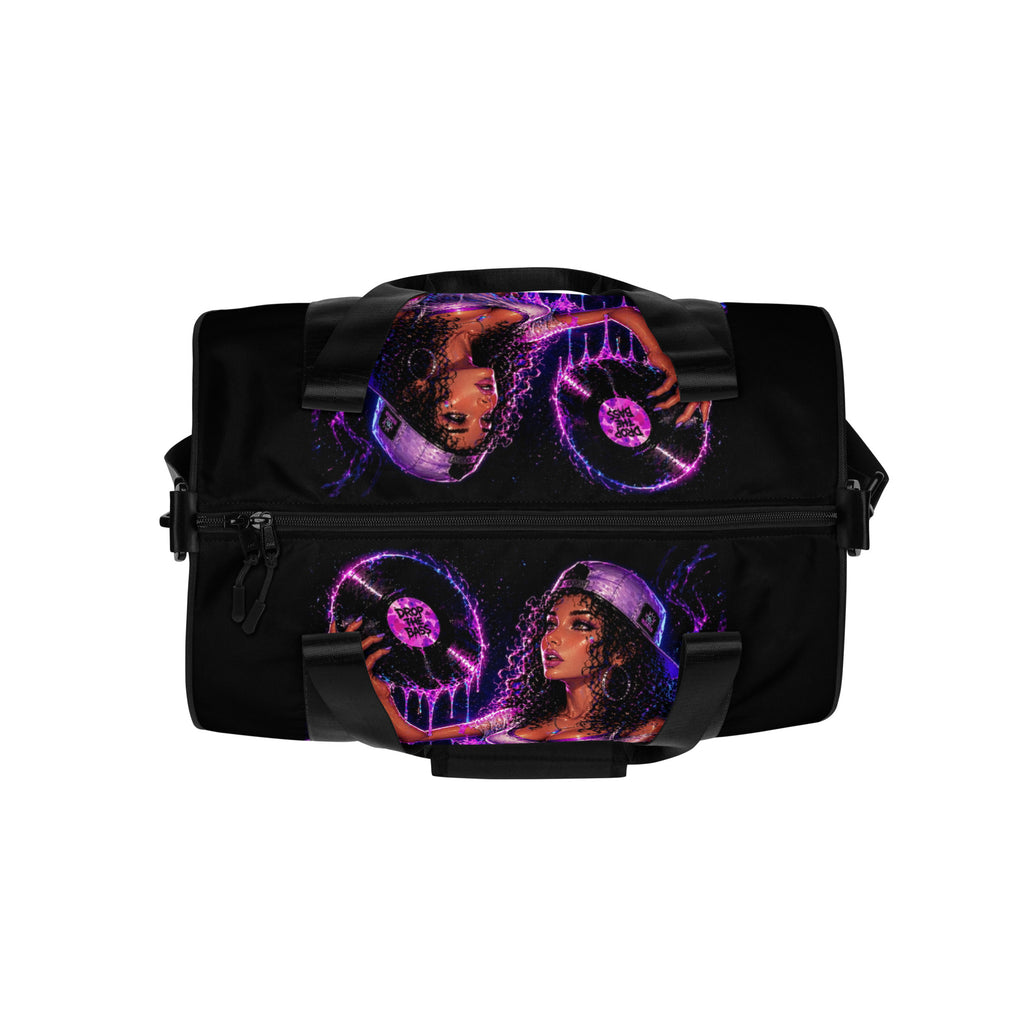 Top view of Drop the Bass all-over print gym bag with black handles and original artwork