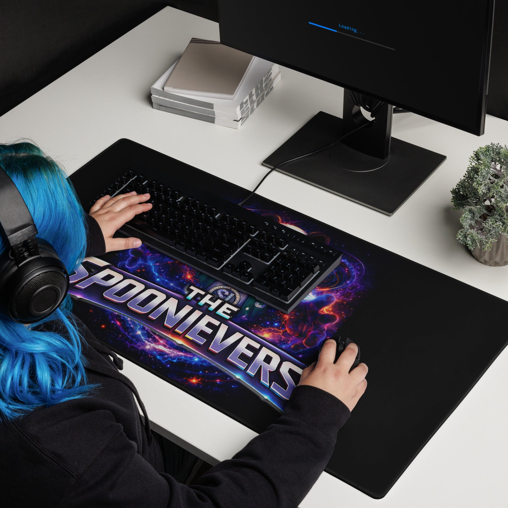Spoonieverse logo desk mat in desktop workspace setup